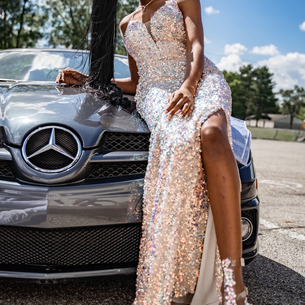 Special occasion dress with iridescent sequins and a slit